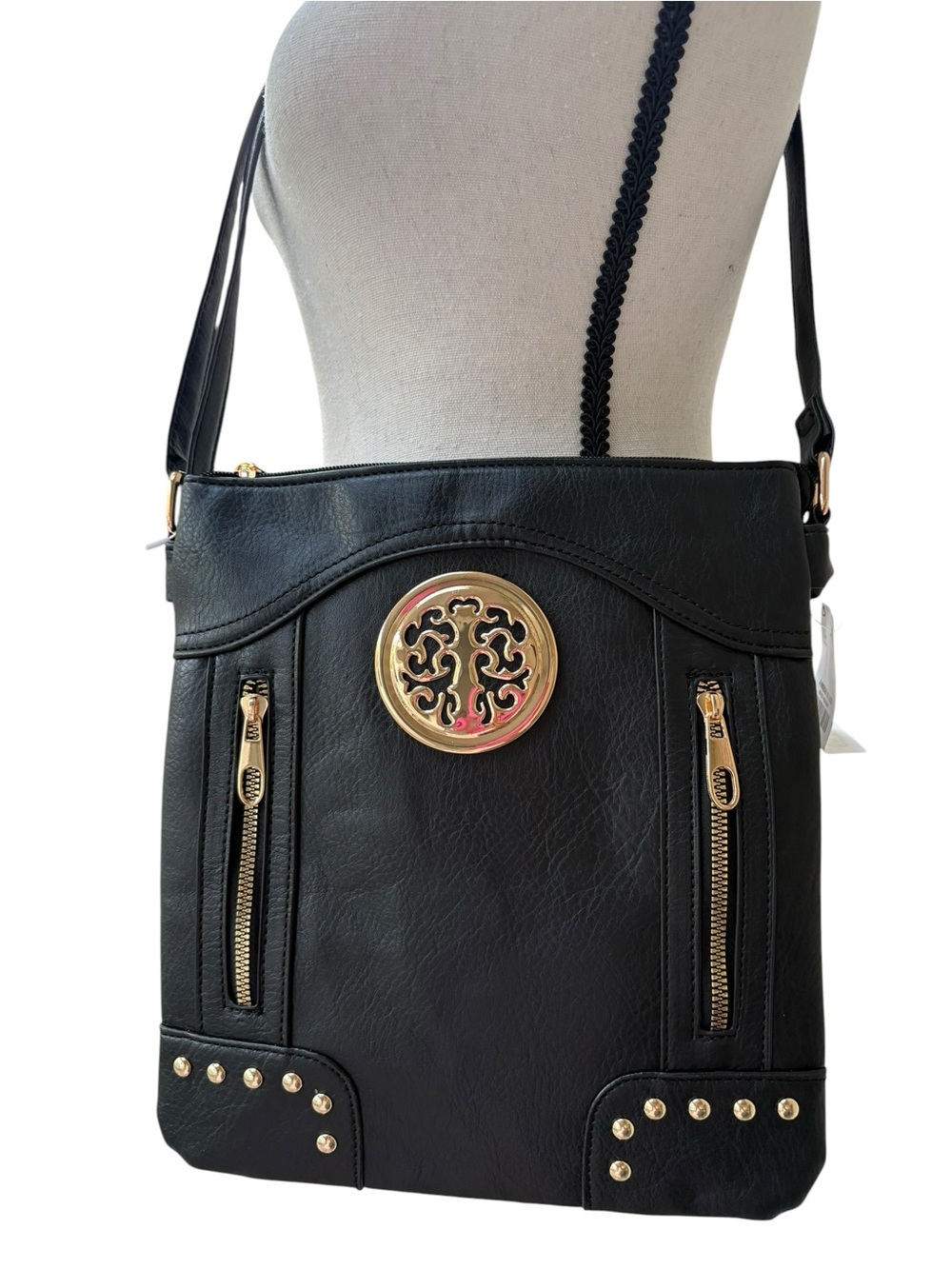 Women's Black Crossbody Bag with Gold Medallion Accent